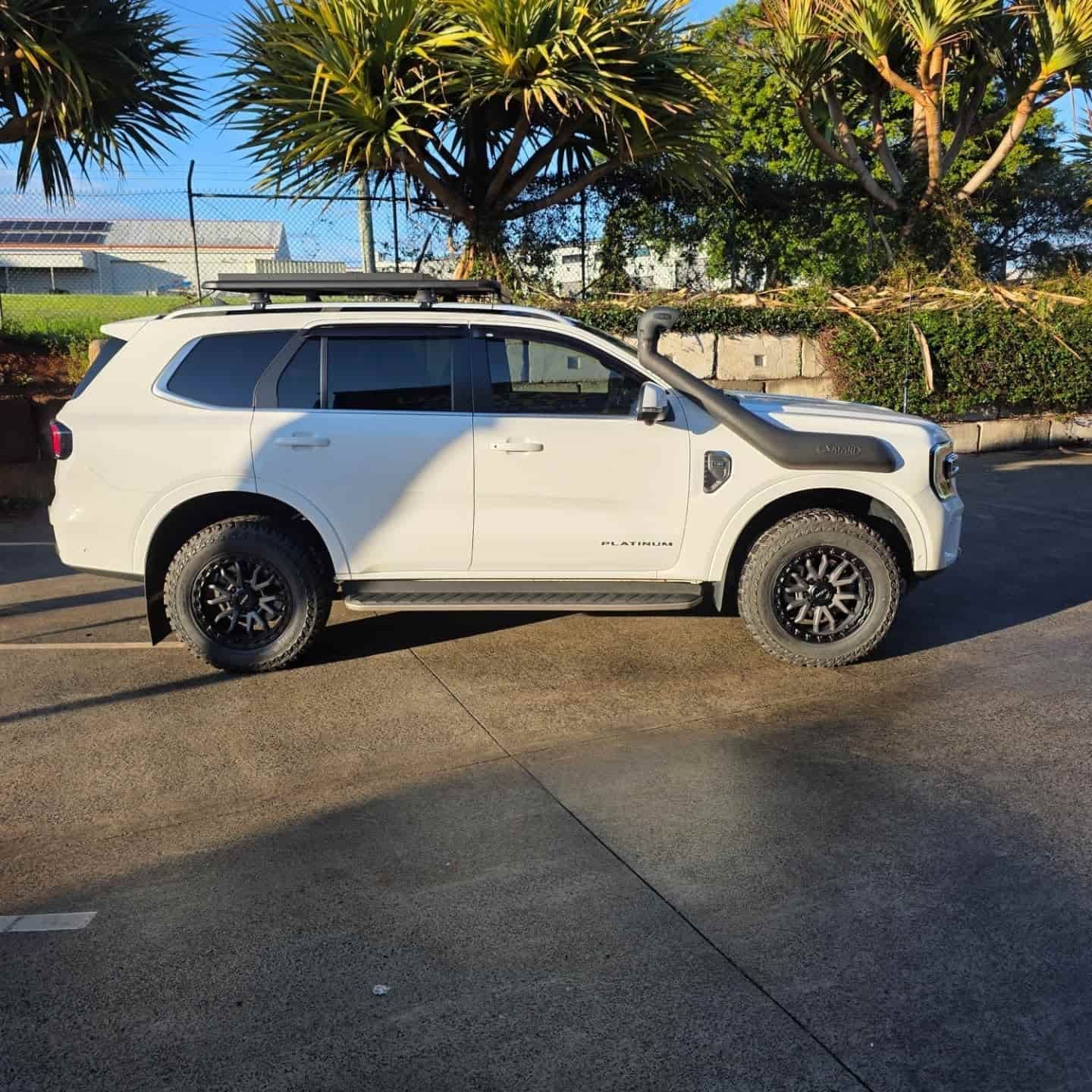 White Ford Everest SUV With Snorkel and Roof Rack Parked in Lot — Plateau Tyres in Alstonville, NSW