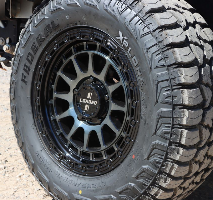 A Silver Speedy Wheel With a Black Center Cap — Plateau Tyres in Alstonville, NSW