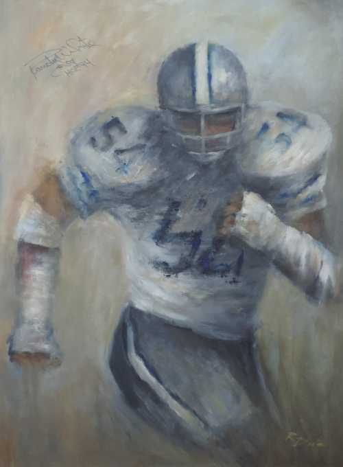 Football player in Dallas Cowboys uniform running; primarily white and blue with a neutral background.