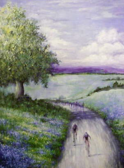 Cyclists on a road through a field of wildflowers with a large tree under a cloudy sky.