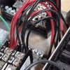 A bunch of wires are connected to a electrical box