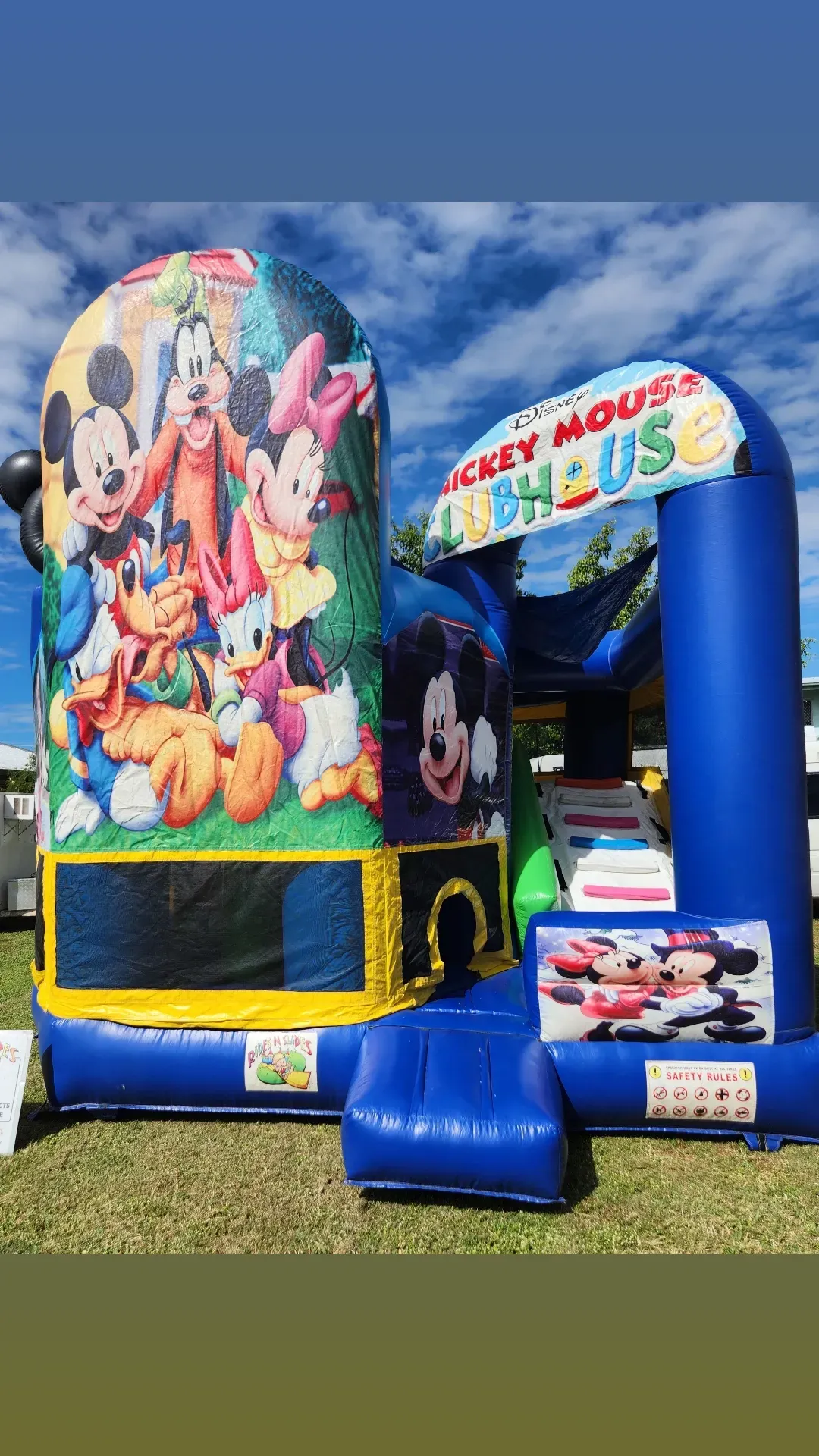 A Large Inflatable Truck Is Sitting On Top Of A Lush Green Field — Rides N Slides In Townsville, QLD