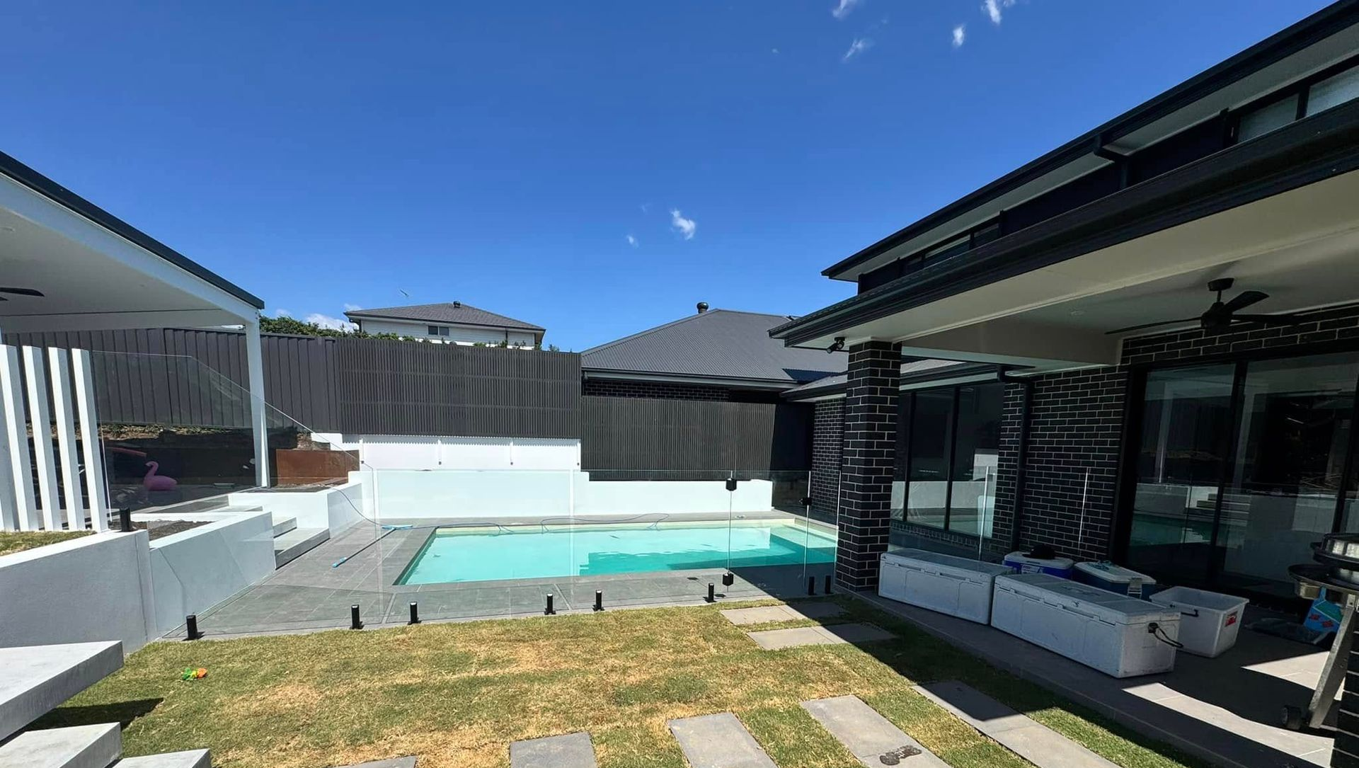 A House with Swimming Pool and Clear Glass Fence — ClearView Glass Pool Fencing In Sutherland Shire, NSW