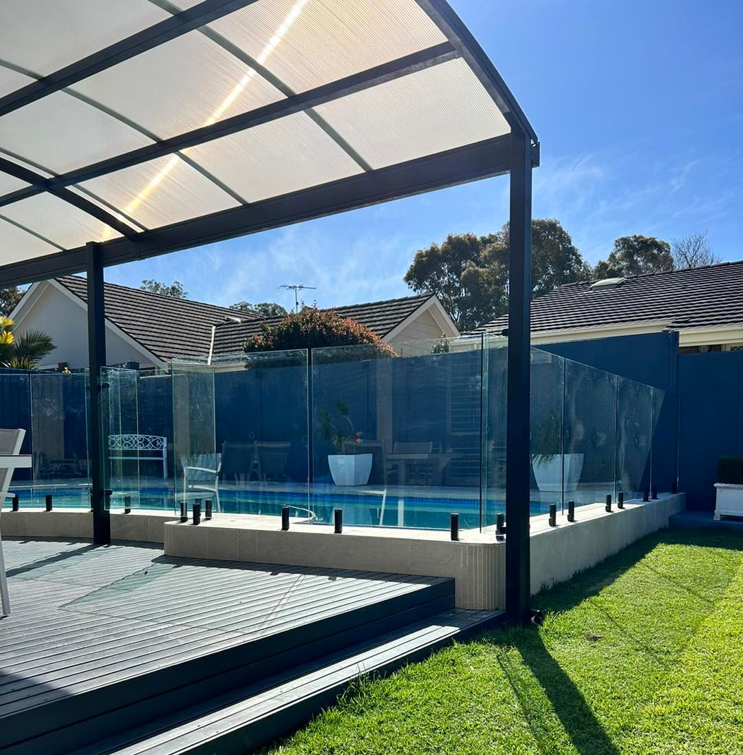 A Backyard Swimming Pool and Clear Glass Fencing — ClearView Glass Pool Fencing In Sutherland Shire, NSW