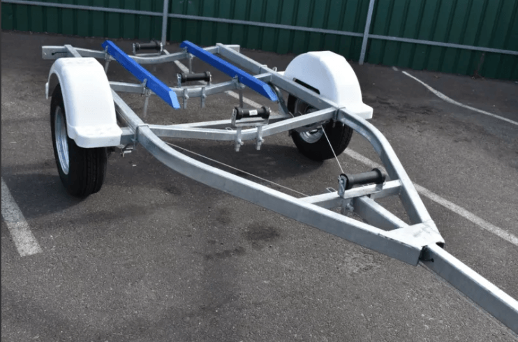 A Boat Trailer Is Parked In A Parking Lot - Voyager Trailers in Yarrawonga, NT
