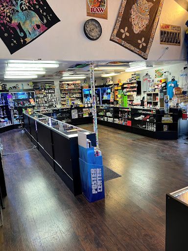 A store filled with lots of items and posters on the walls.