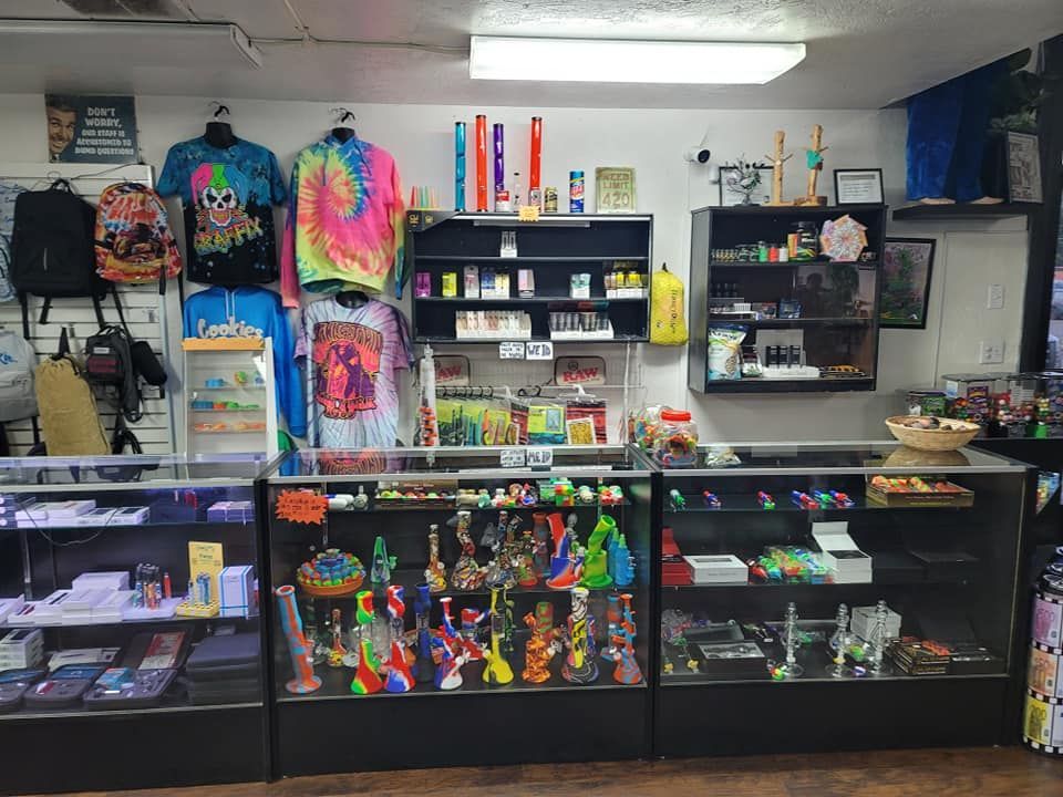 A store filled with lots of clothes , toys , and other items.