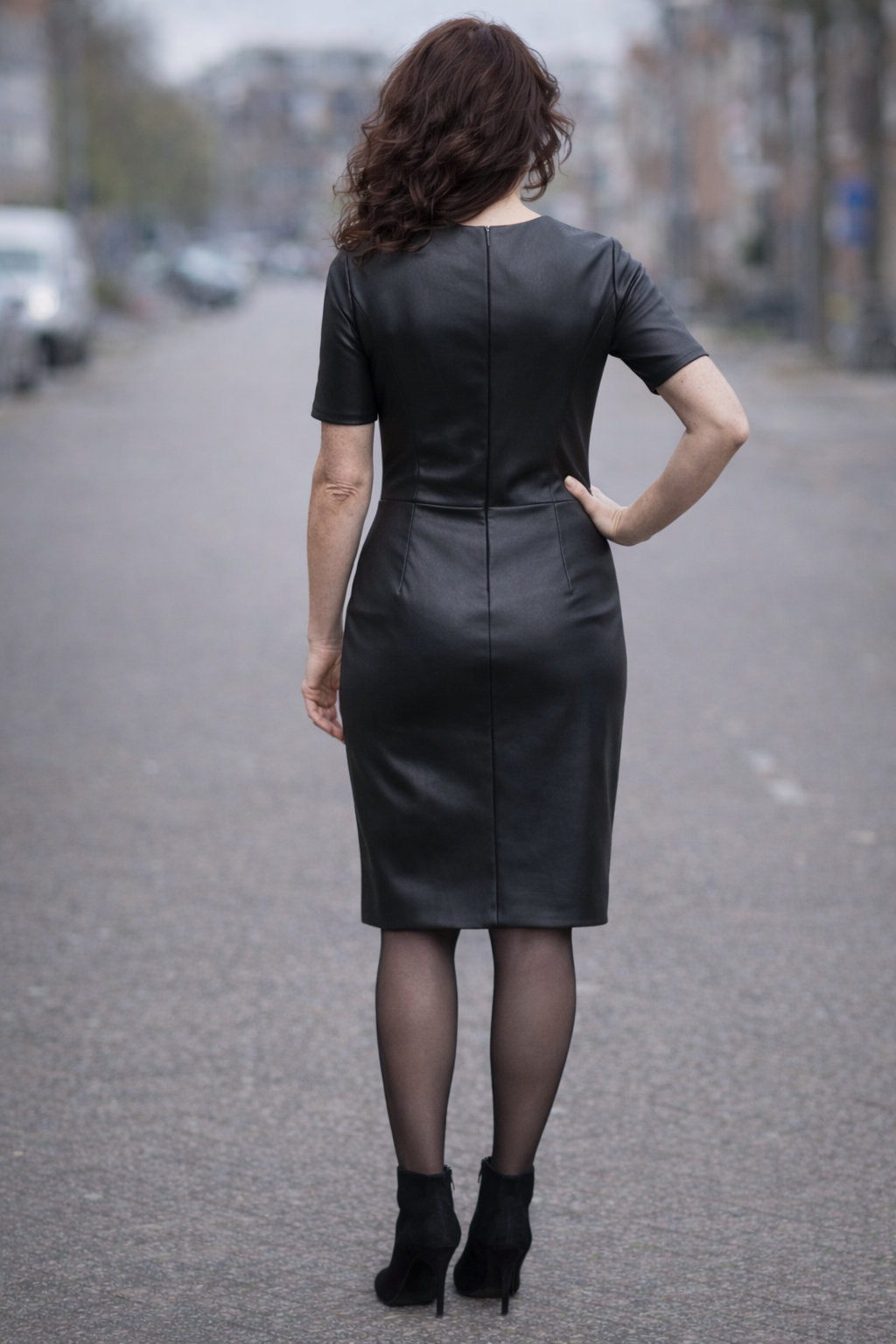 Zwarte leren stretch jurk middenachter een blinde rits Zwarte leren stretch jurk