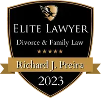 A shield with the words `` elite lawyer divorce & family law '' on it.