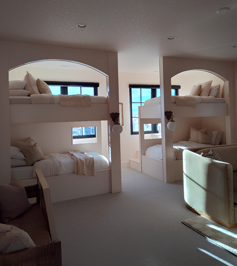 Bunk beds built into alcoves, white walls, light brown bedding, black window frames.