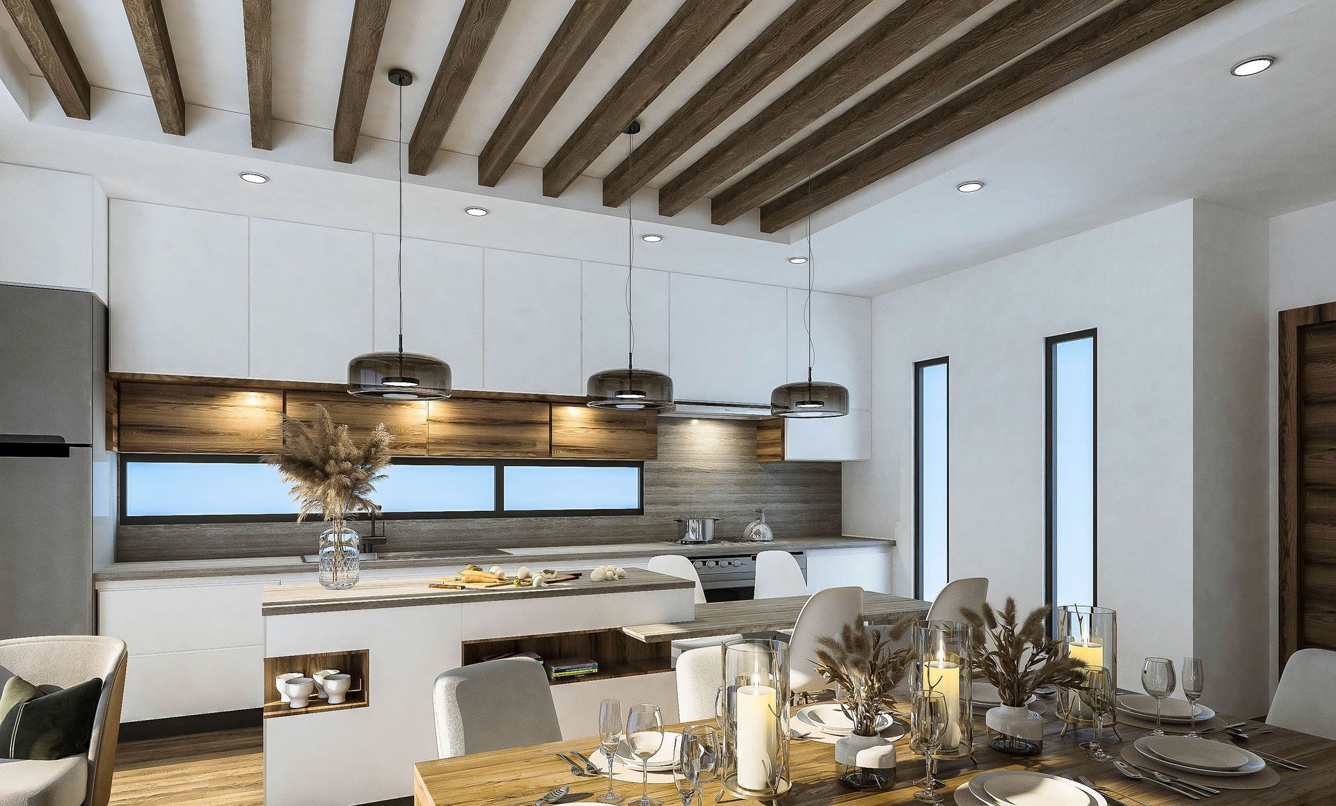 Modern kitchen with white cabinets, wooden beams, and island. Dining table set.