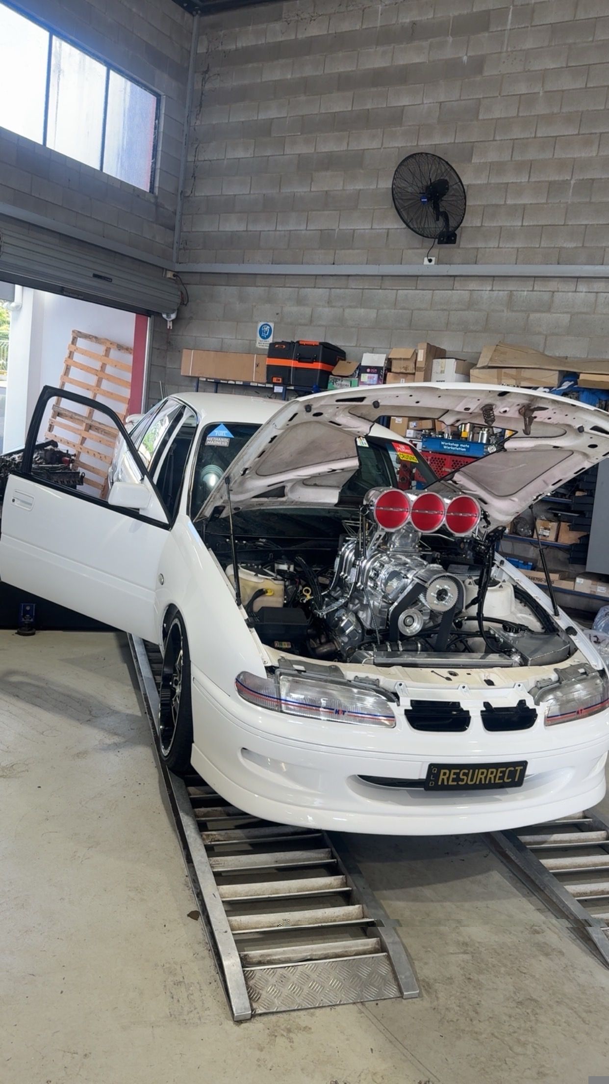 Laptop Displaying Engine Performance Data Sits on a Car Engine — Advanced Auto Electrics & Mechanical in Innisfail, QLD