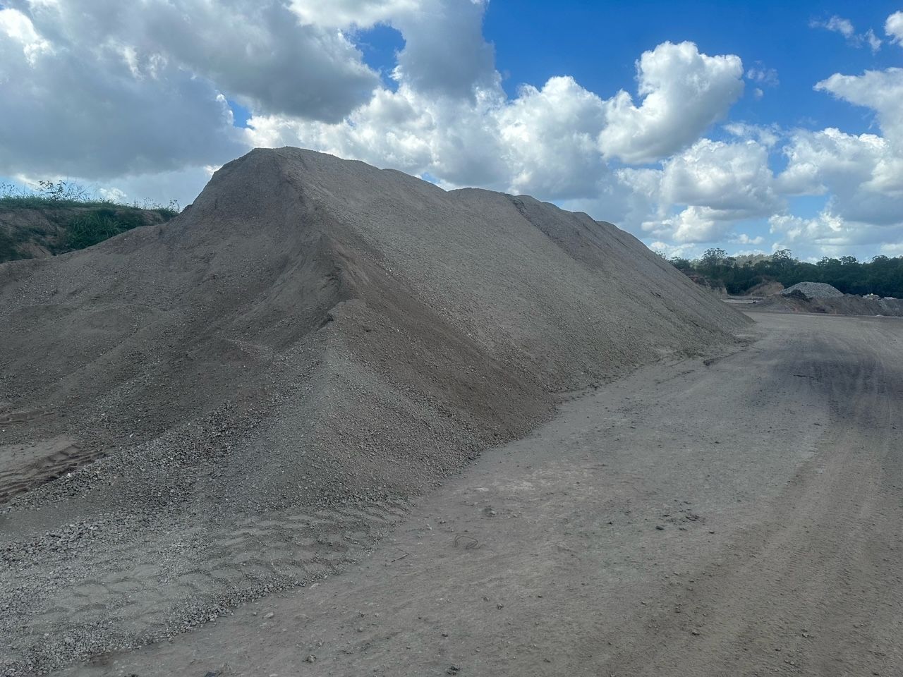 Large Gray Gravel Pile in an Open Yard — Envy Landscape Supplies In Urangan, QLD