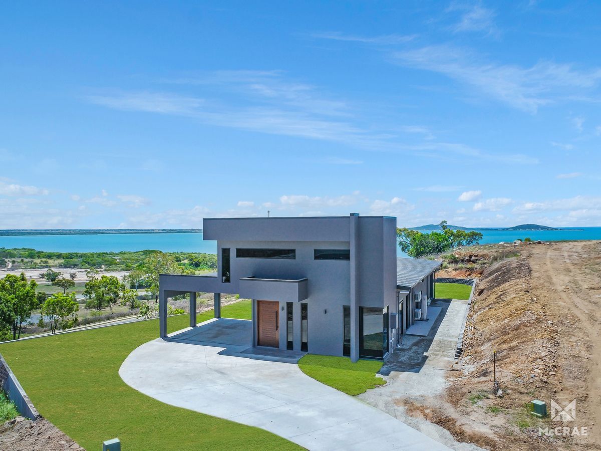 Modern Gray House With a Long Driveway and Ocean View — Red Emperor Constructions in Cannonvale, QLD