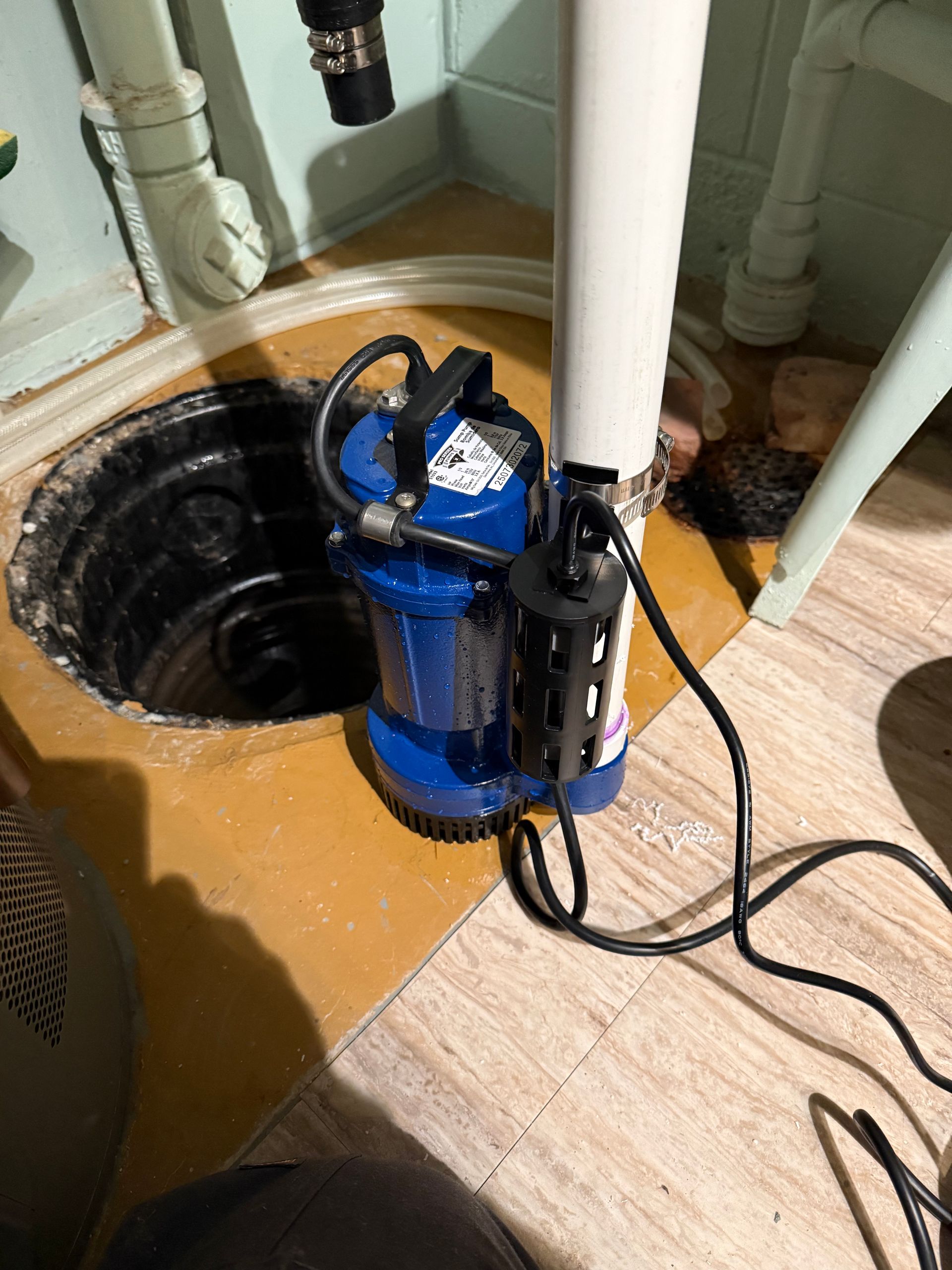 Water softener tank with control head in a basement utility area