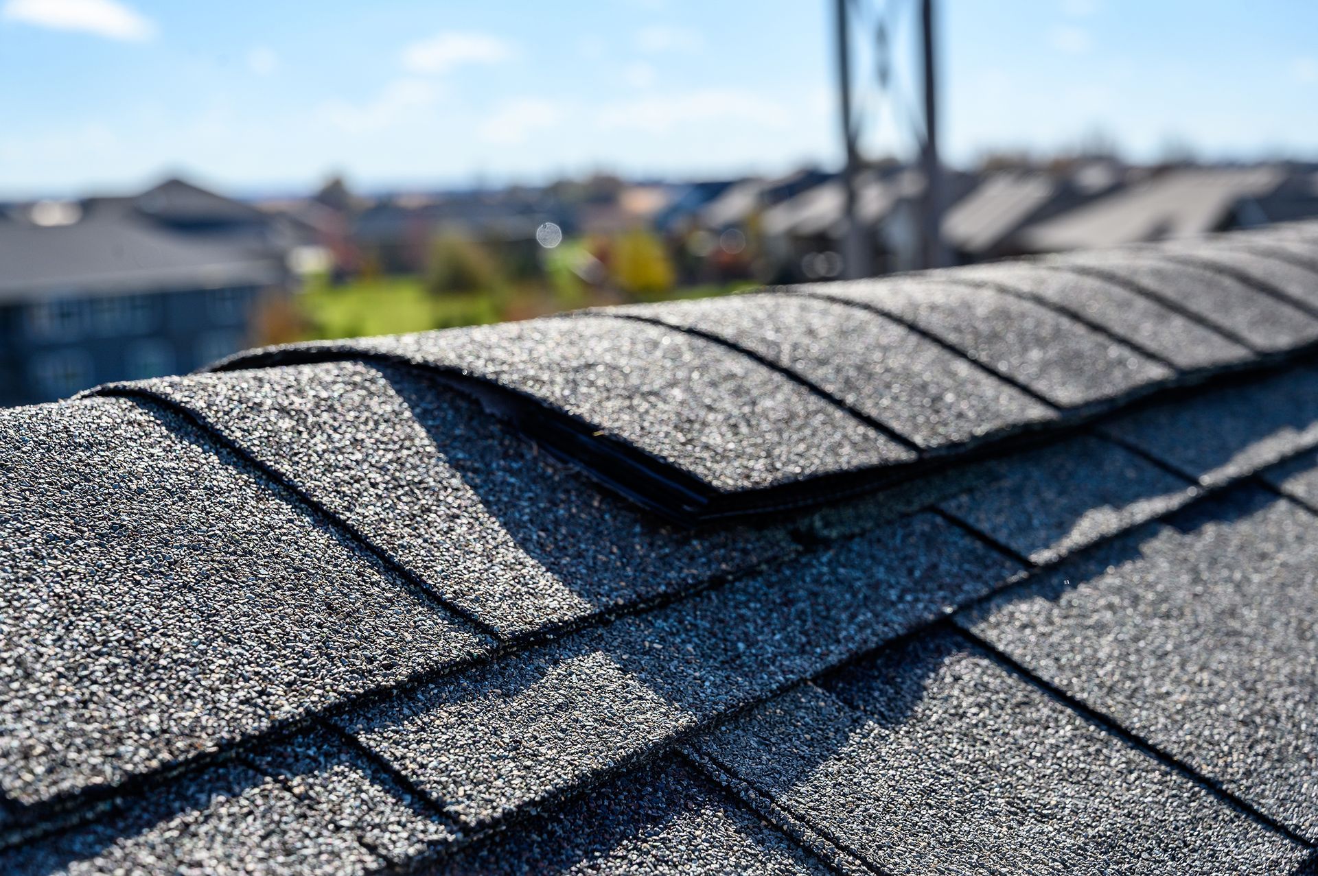 A close up of a roof with shingles on it.