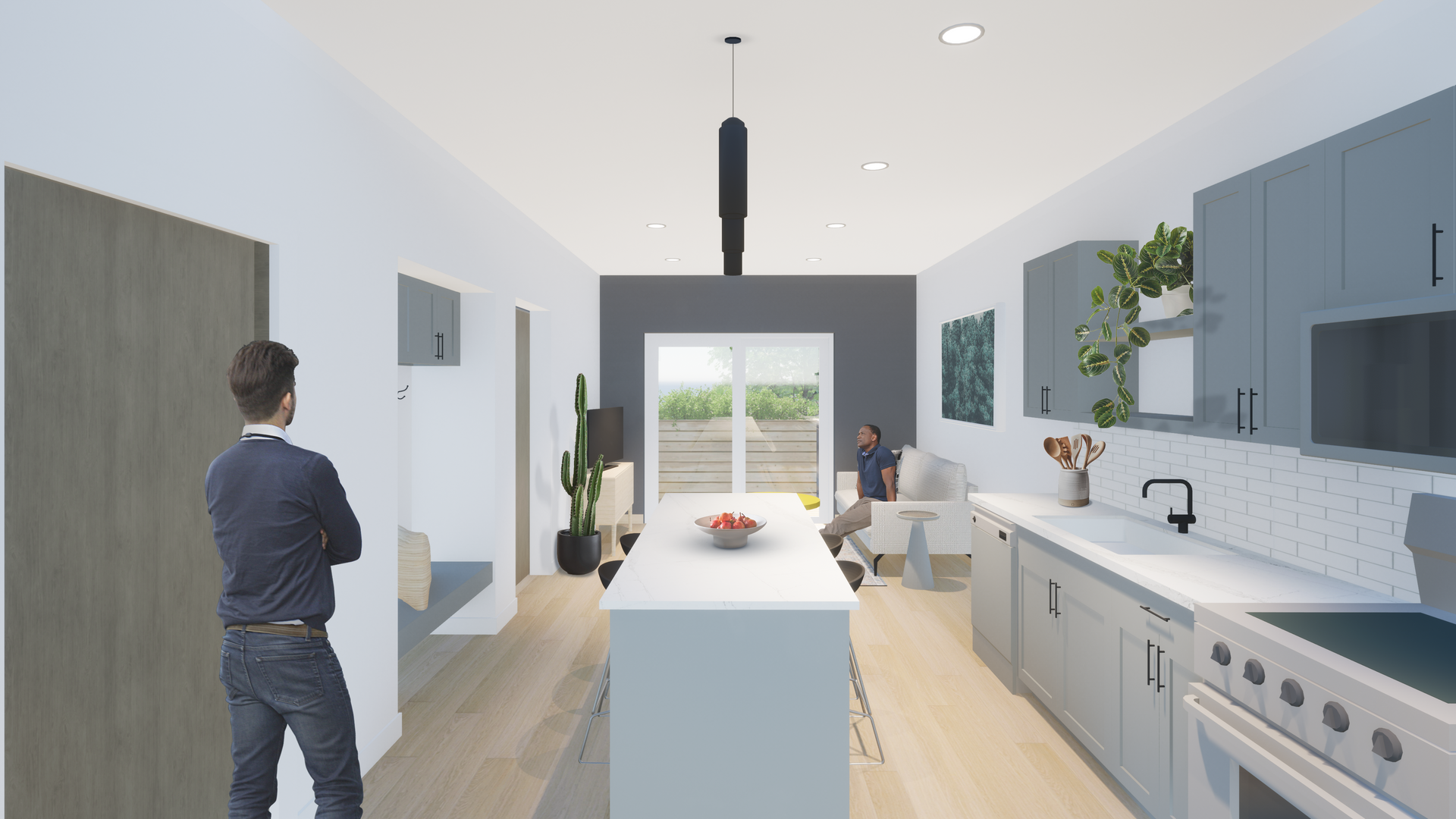 A man is standing in a kitchen looking at a living room.