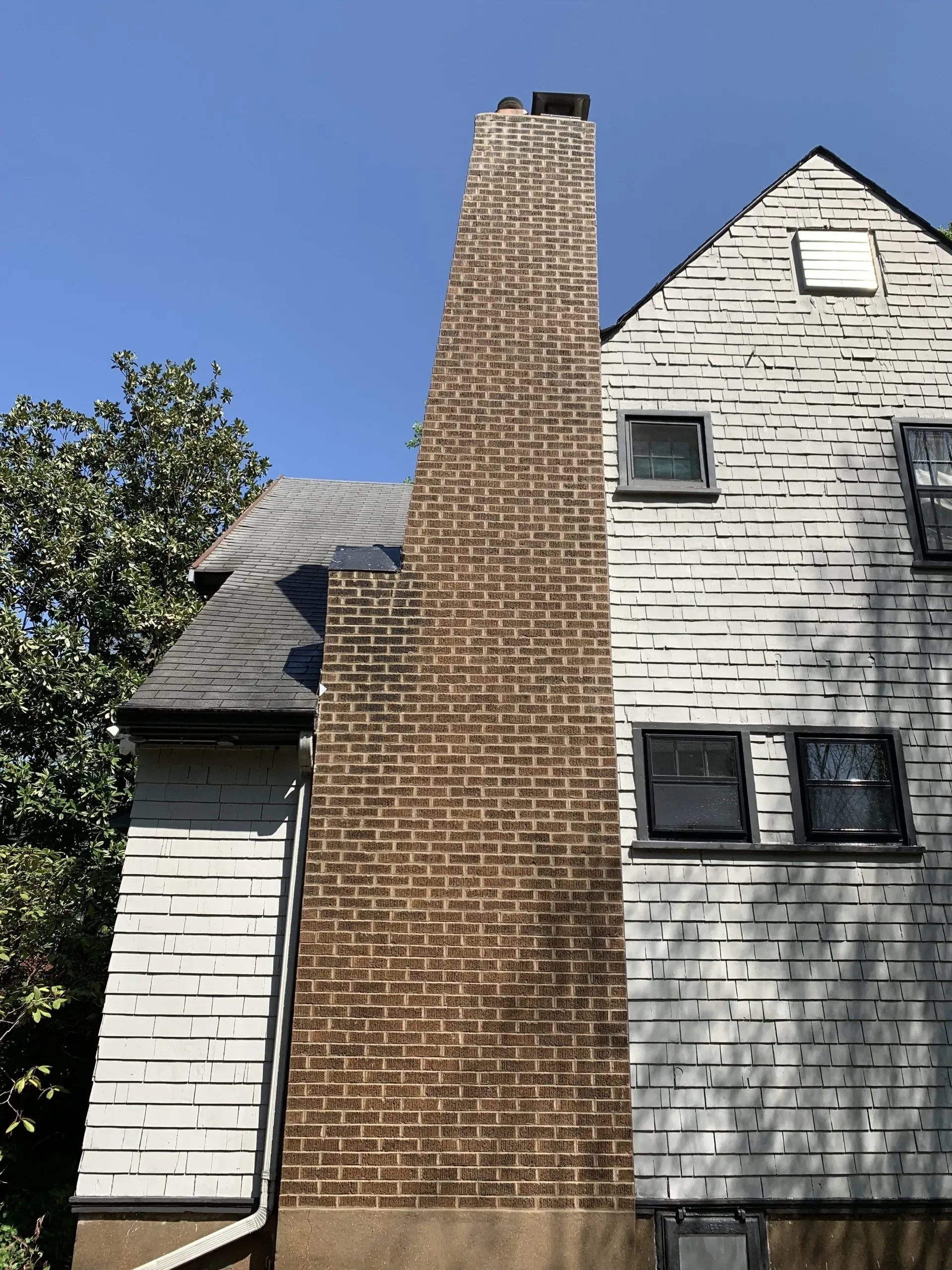 Residential brick chimney tuckpointing and repair in St. Louis, MO by Mirelli Tuckpointing LLC.