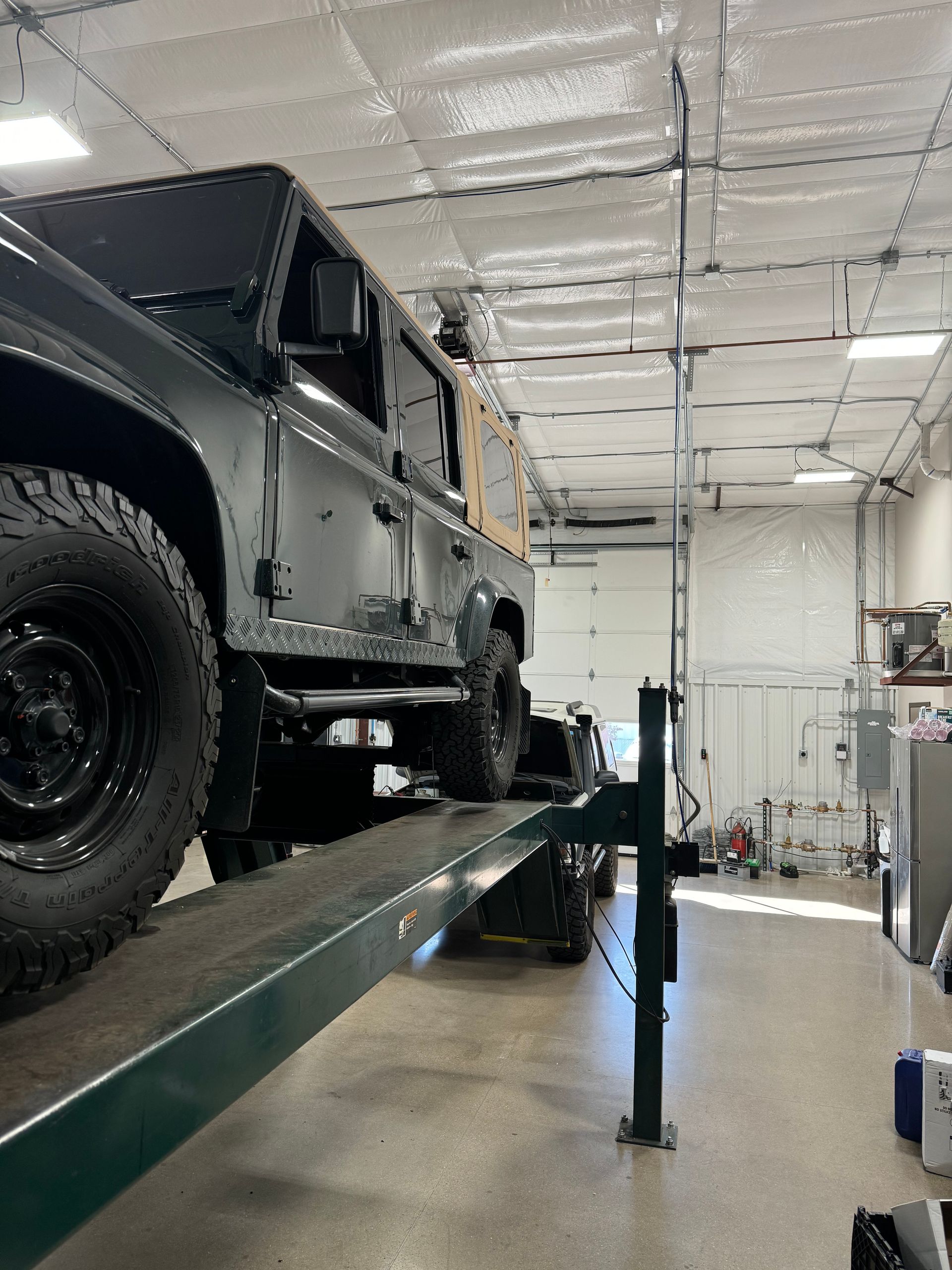 Black Land Rover Defender SUV | Peak European