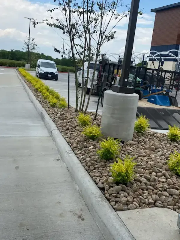 A white van is parked in a parking lot