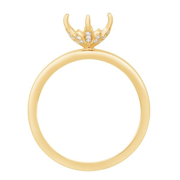 A gold ring with a crown on top of it