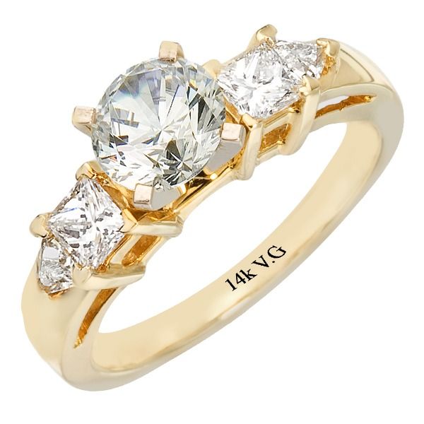 A yellow gold ring with 14k vg written on it