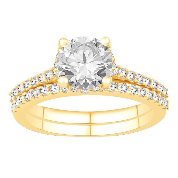 A yellow gold ring with a diamond in the center