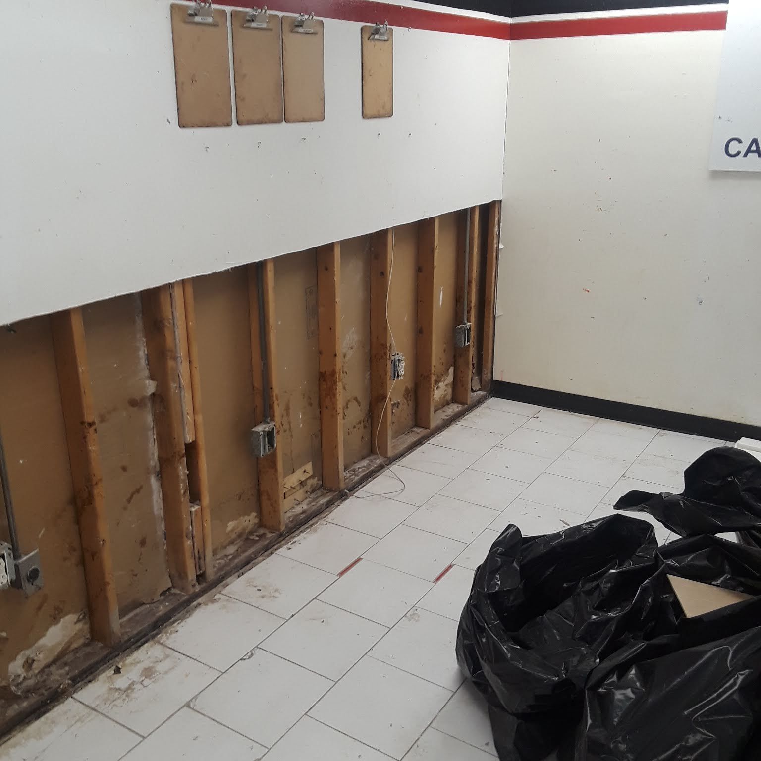 A room with a sign that says caution on it