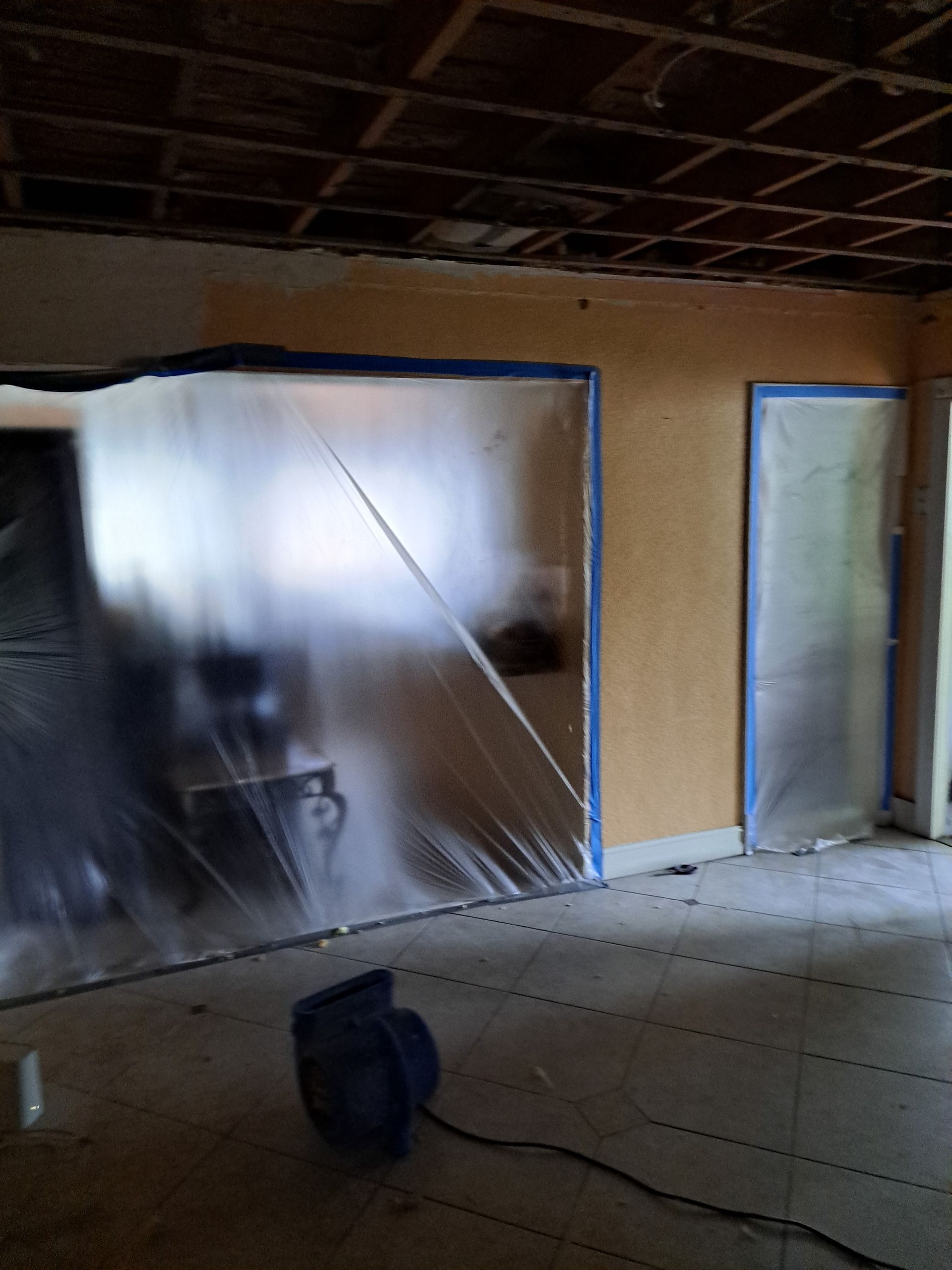 A room with a plastic covering on the walls