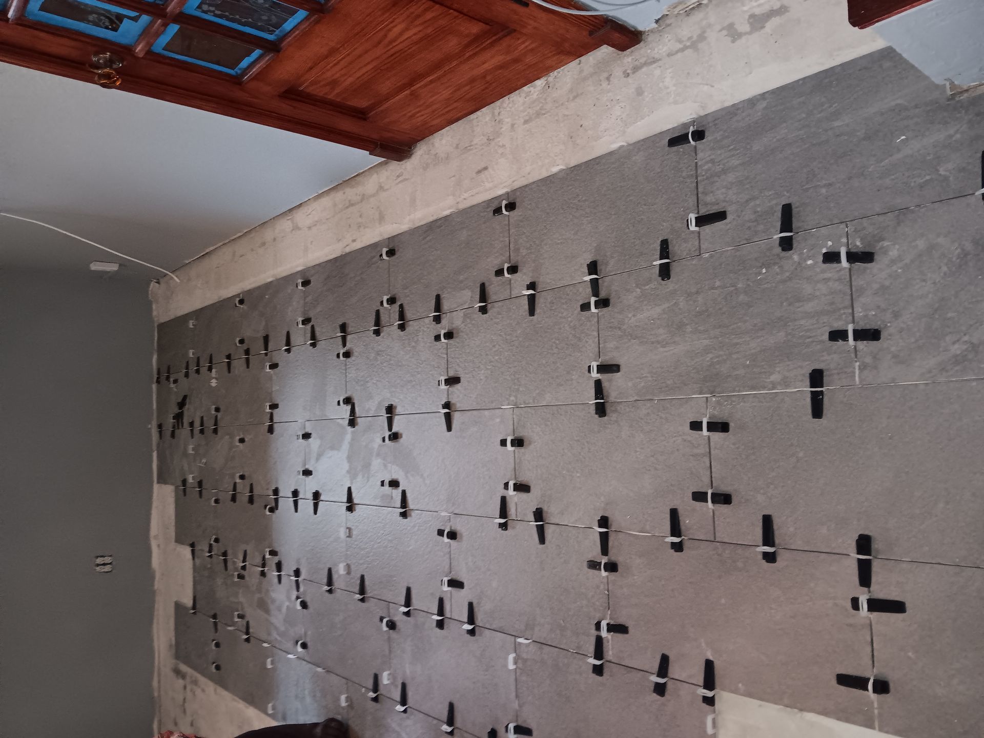 A wall with a lot of numbers on it