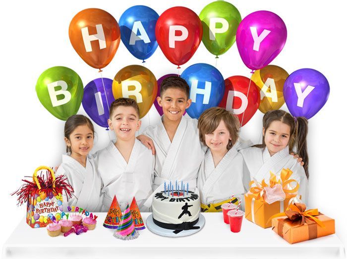a group of children wearing karate uniforms with different belts