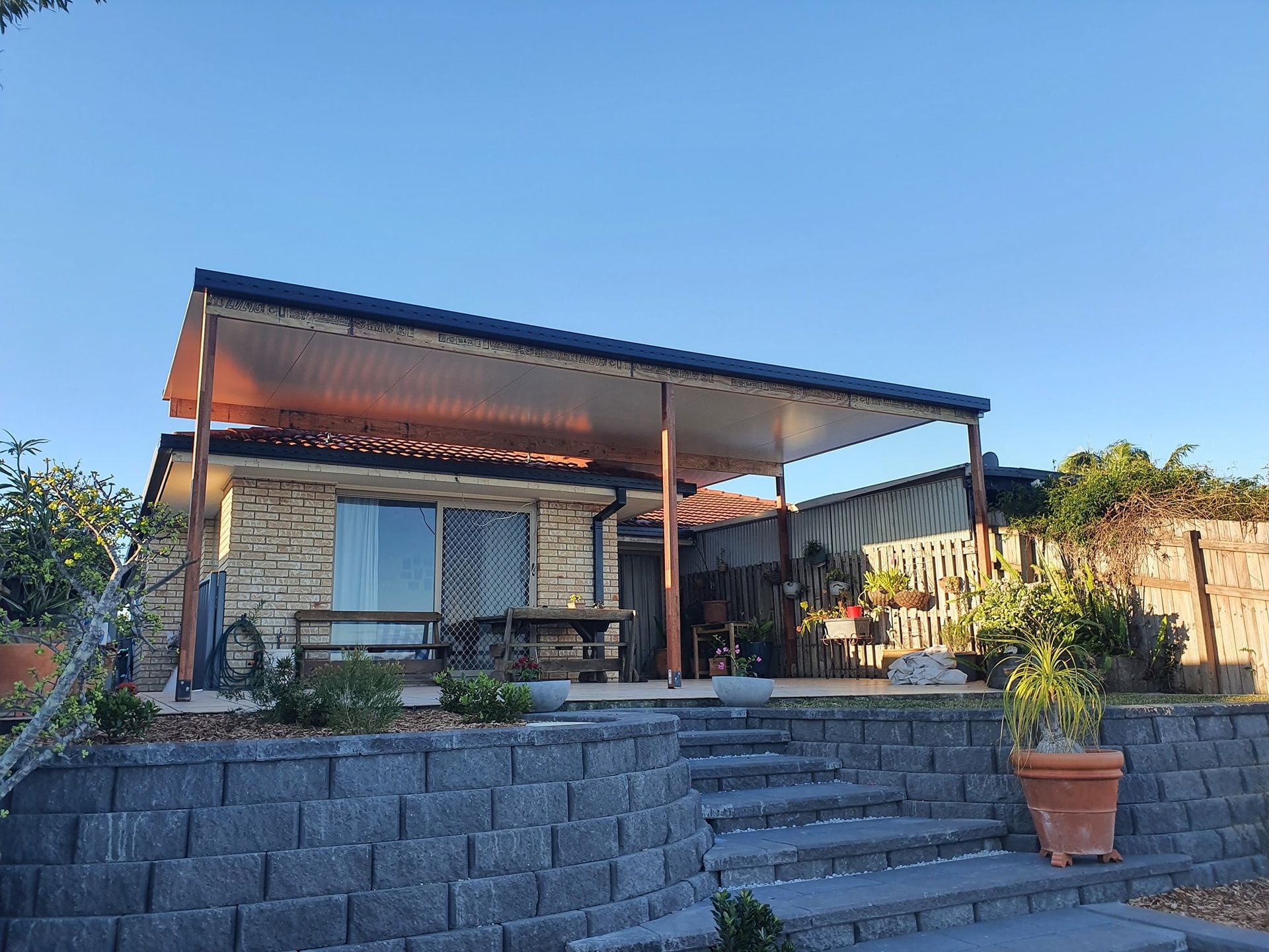 Set of Stairs Built Into a Brick Wall — Red Dog Landscaping in Banora Point, NSW