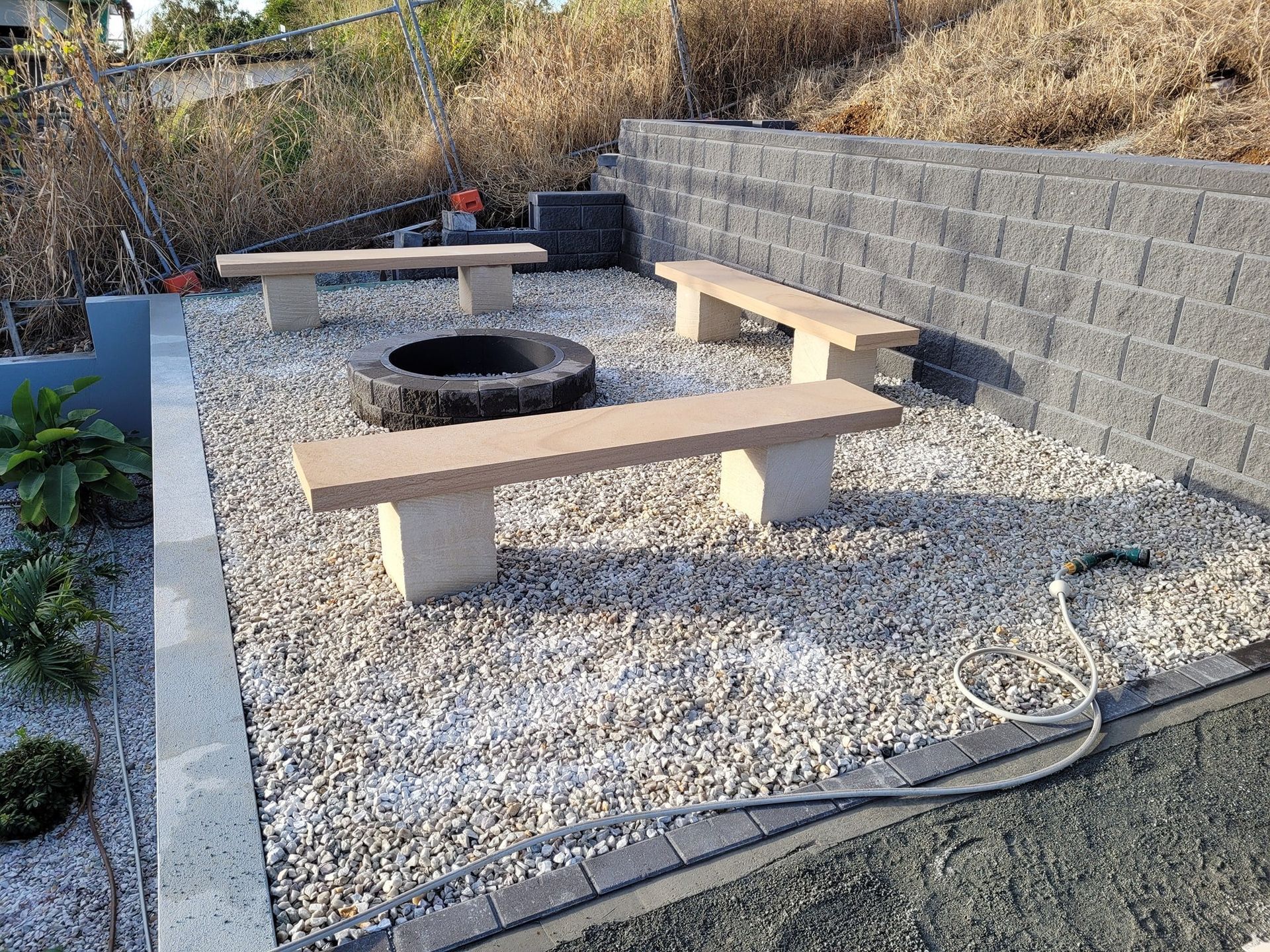 Retaining Wall With Seated Fire Pit — Red Dog Landscaping in Banora Point, NSW