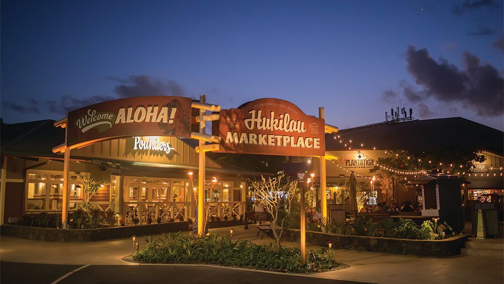A building with a sign that says aloha on it