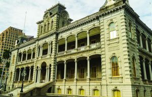 A large building with a lot of windows and balconies