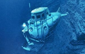 A submarine is floating on top of a body of water.
