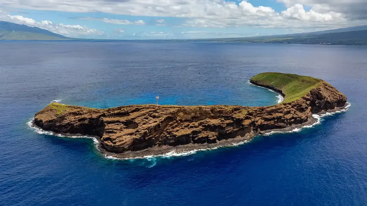 Molokini Crater off the Island of Maui is a sunken volcano that is one of Hawaii's premier snorkeling spots.