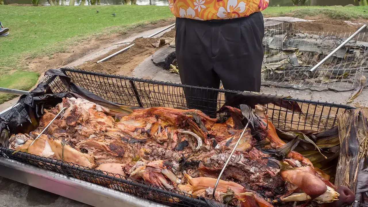 What is served at a traditional Hawaiian luau?