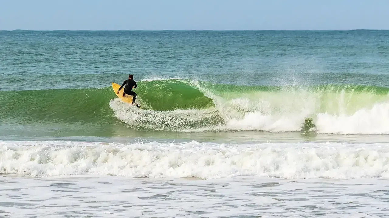 Surfing off Paia, Maui, Hawaii.