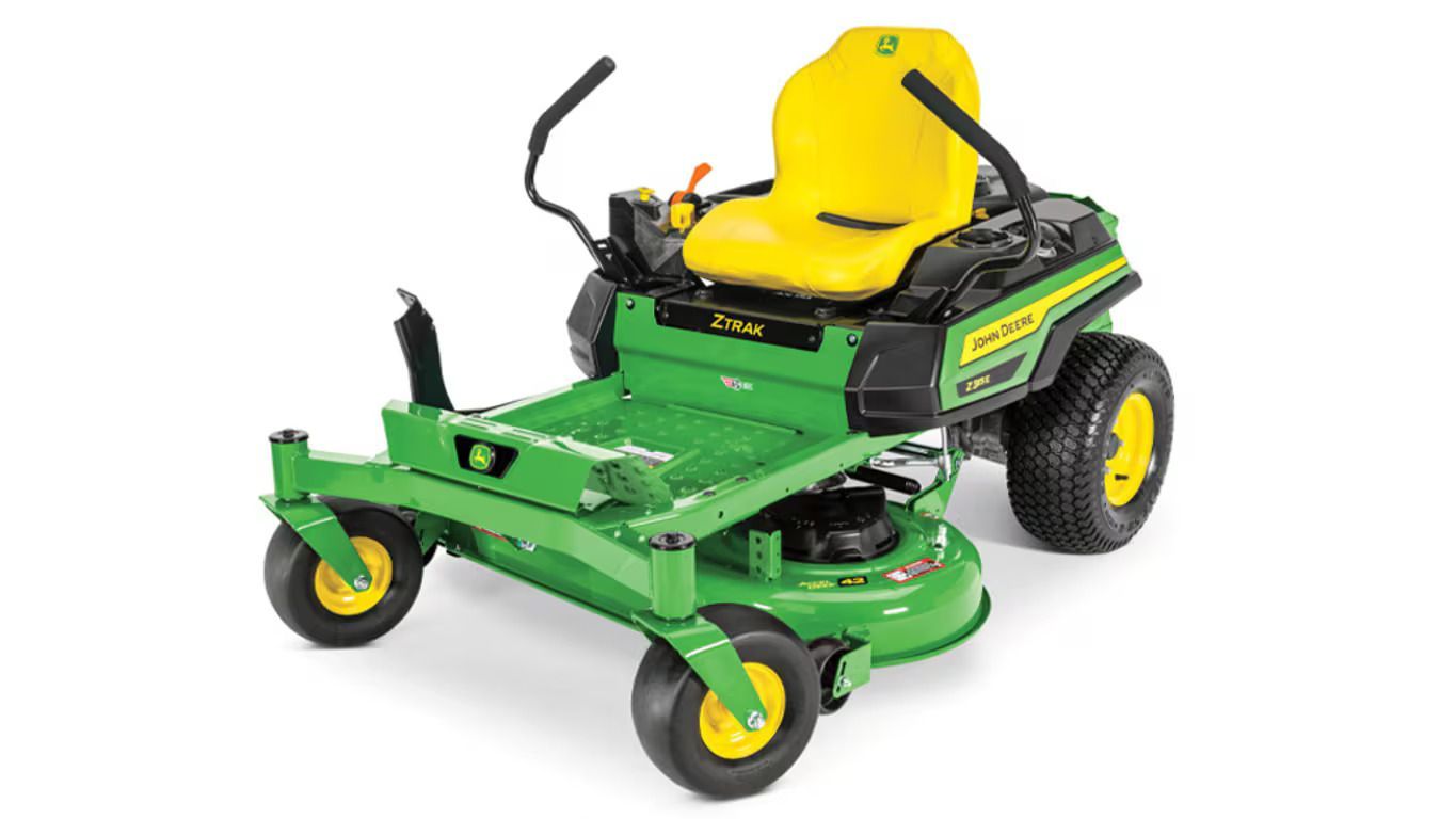 A green and yellow John Deere Z300 series zero-turn riding lawn mower on a white background.