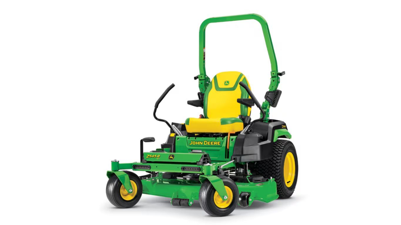 A green and yellow John Deere Z545R ZTrak zero-turn riding mower with a roll bar, set against a white background.