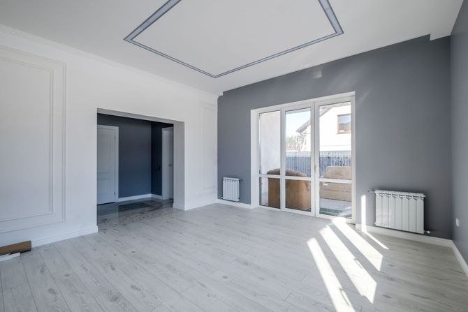Newly finished white interior room undergoing renovation after professional drywall service in Moreno Valley, CA.
