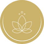 A gold circle with a white lotus flower inside of it.