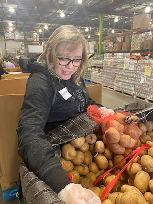 Susan helps at local food drive