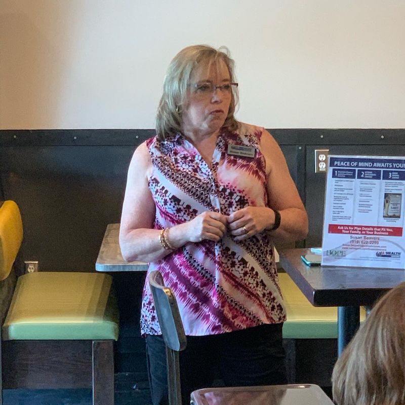 Susan Beavers speaking to a group