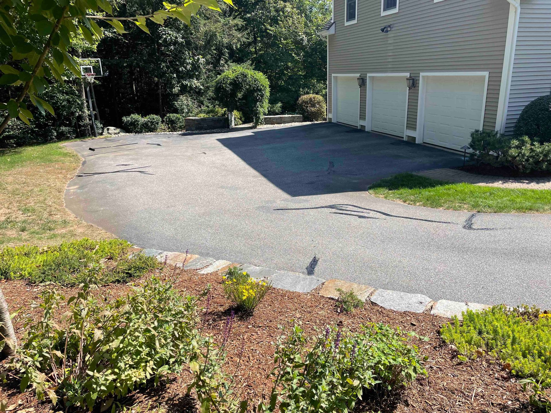 Crack filling older sun faded driveway need or repair, Connecticut Landscape Solutions
