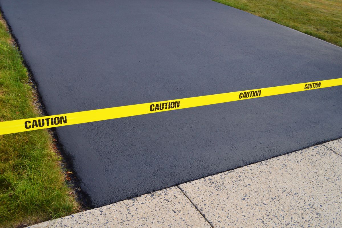 Asphalt Driveway SealCoating and Repair in West Hartford, Connecticut Landscape Solutions