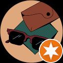 A pair of sunglasses sitting on top of a book next to a wallet.