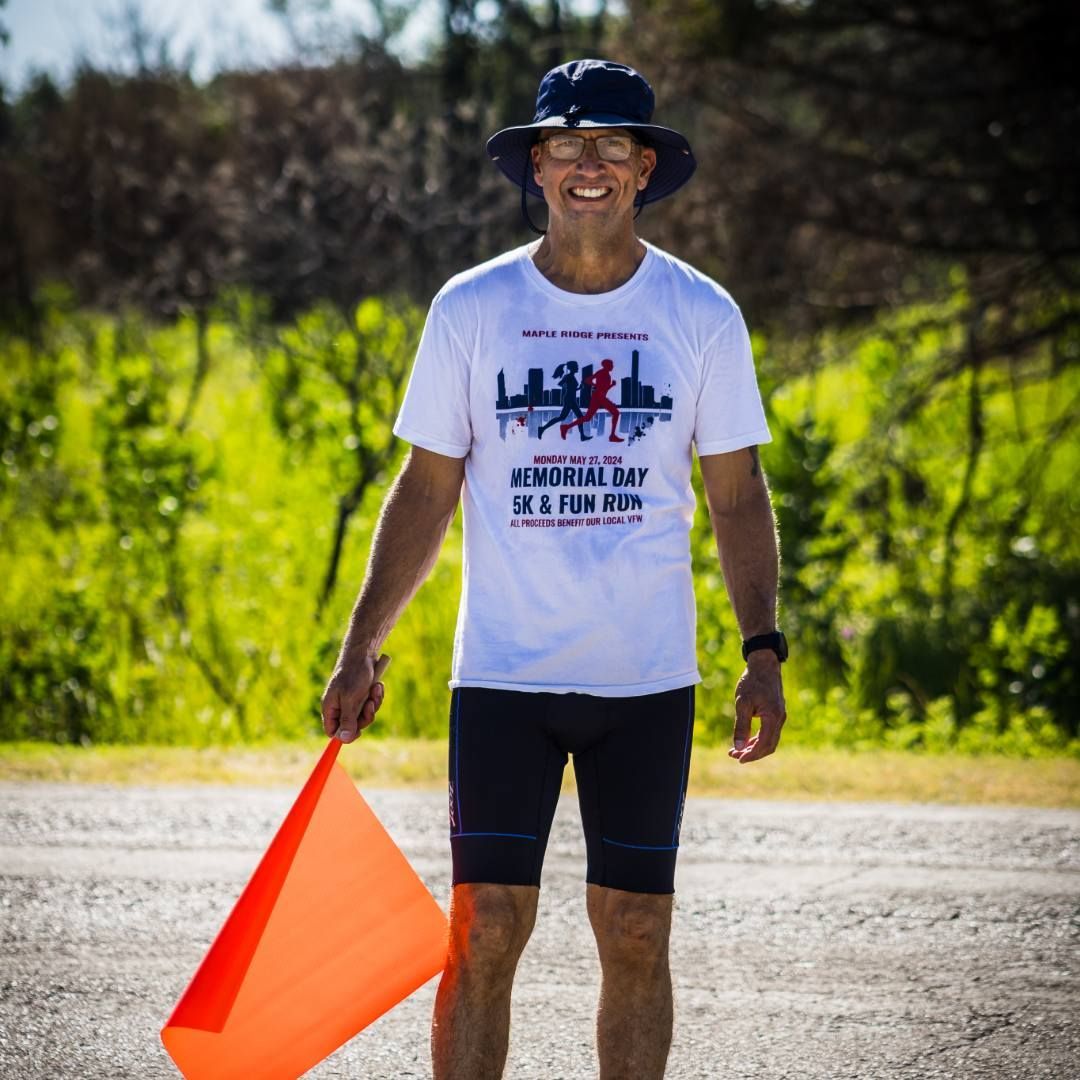 Coy Orange volunteering at Tulsa Triathlon 2024