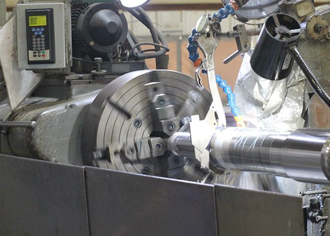 The surface of a part being washed and roughened.